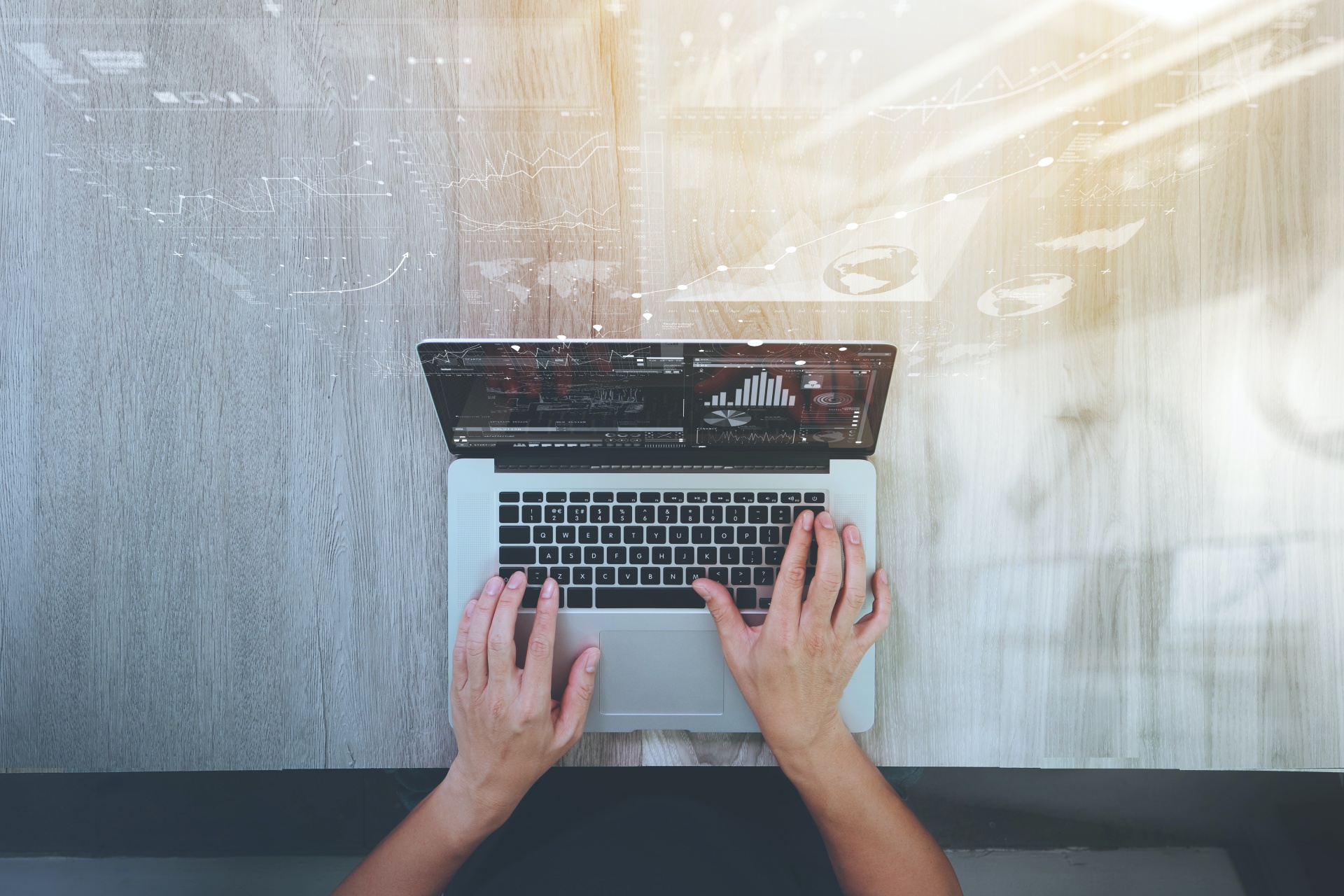 Person looking at data on a laptop